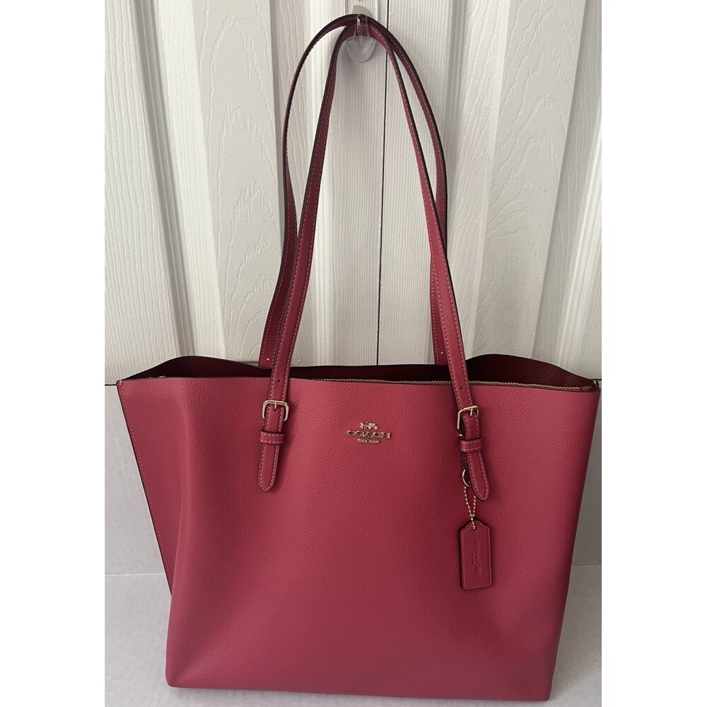 Coach Mollie Tote Strawberry Haze/Wine interior. 1671 Excellent condition.